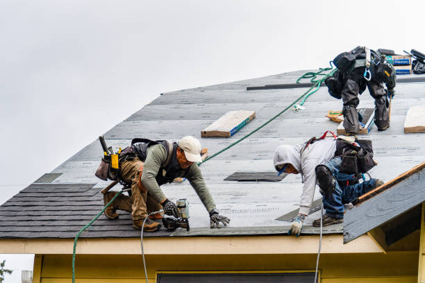 Professional Gutter Installation technician working in Ballouville, CT